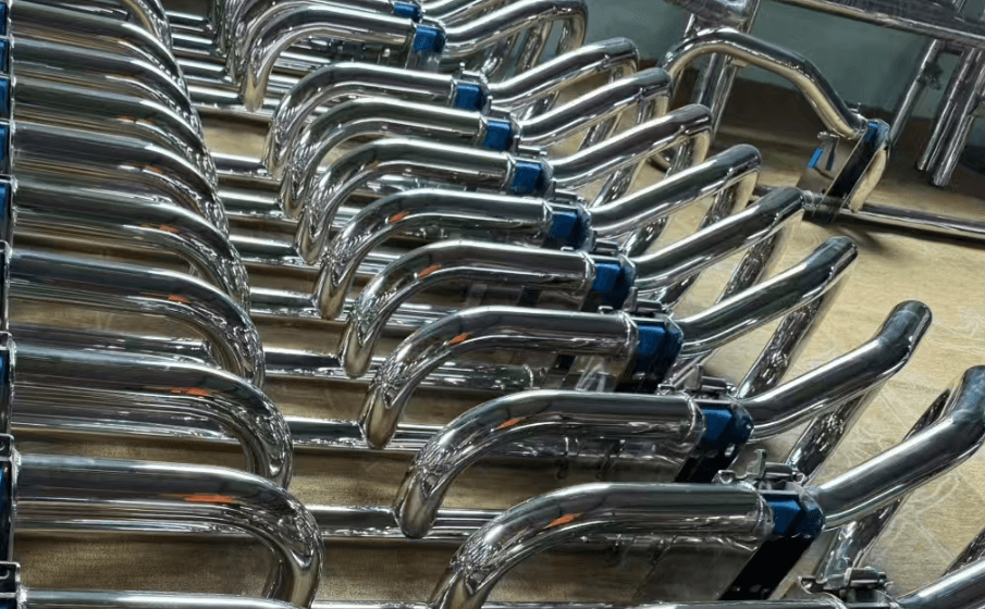 Polished stainless steel bent tubes for heavy-duty truck grille guards arranged after fabrication