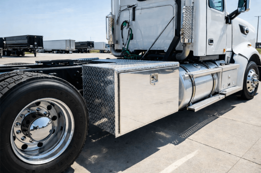 heavy duty aluminum semi truck tool box mounted on a Class 8 semi truck frame for secure tool storage