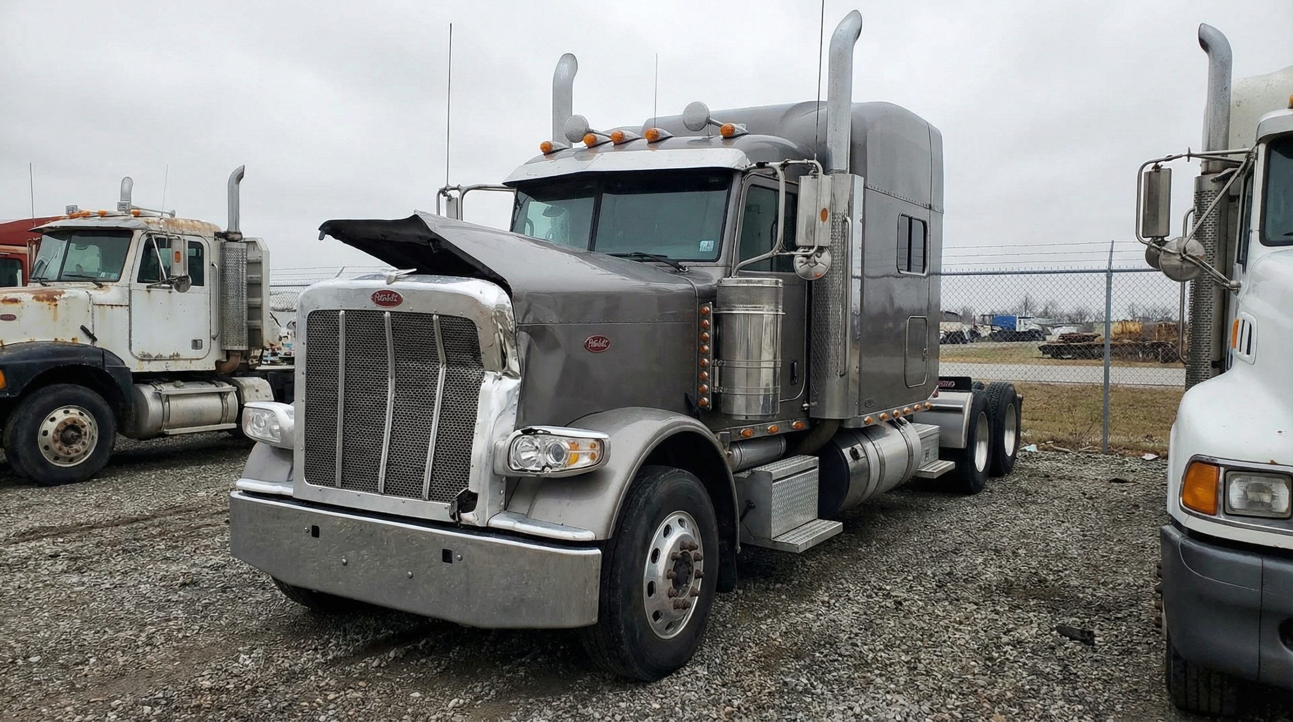Damaged Semi Truck with Front End Collision Impact