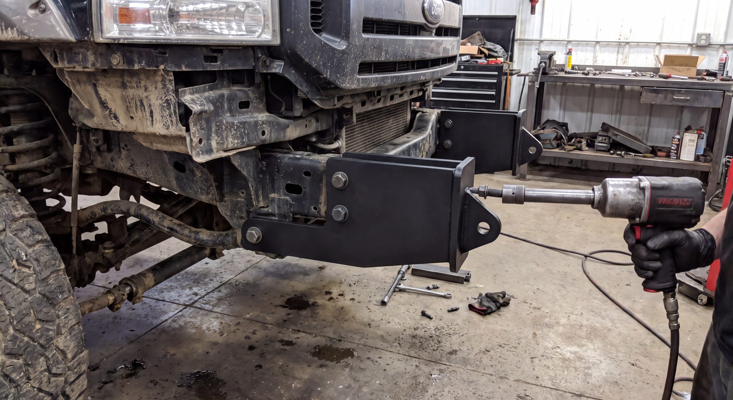 Installing heavy duty mounting brackets onto truck frame