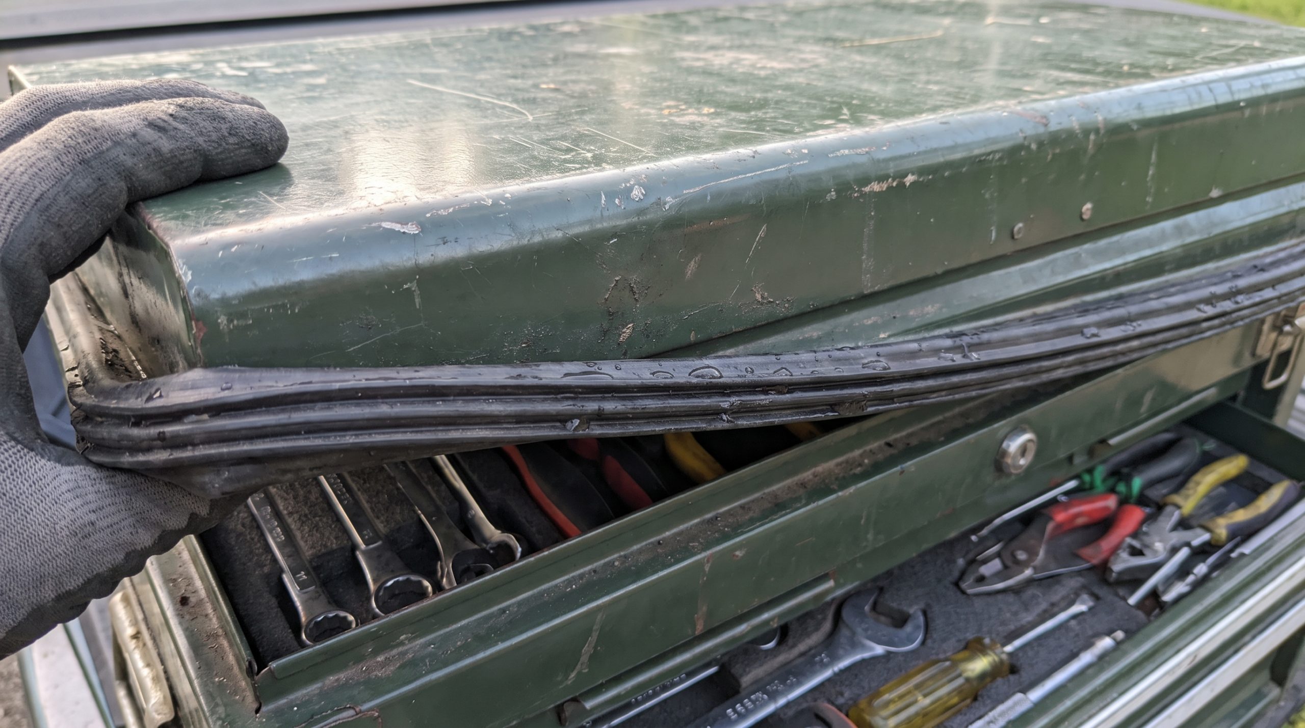 Heavy-duty toolbox lid weather seal close up detail